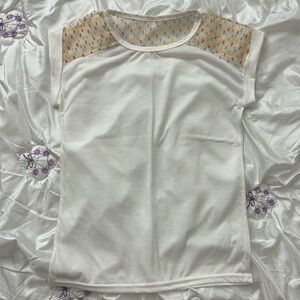 Sleeveless shirt with confetti sheer shoulder